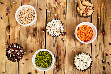 Collection set of beans and legumes. Bowls of various lentils.