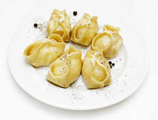 Manti, meat dough on a white background