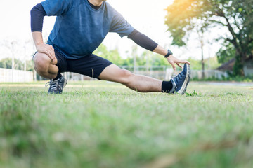 Portrait of fatigued young fit athletic man Muscular for health and strong guy exercising in sportswear outdoors