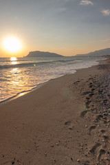 Fototapeta na wymiar Tropical sea beach on summer vacation. Beach with white sand. Alanya, Turkey