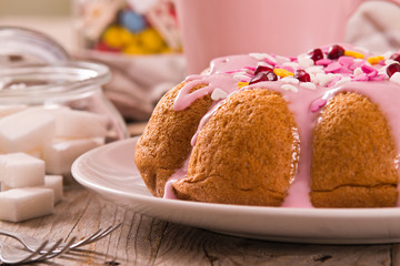Cake with pink frosting.