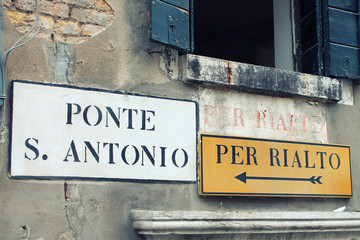 Bridge street sign. Street sign  RIALTO BRIDGE in Venice, Italy 