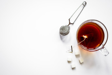 Cup of tea with lumps of sugar top view mock up