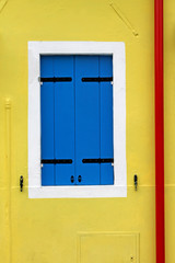 Detail of colorful window in Burano (Venice island). Italy.
