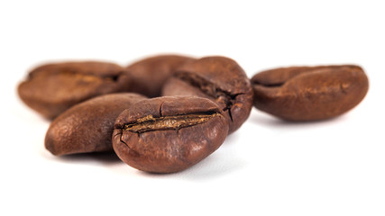 roasted coffee beans isolated on white background