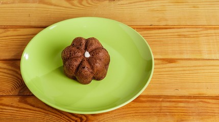 Cake on a plate on the table.