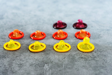 Concept for healthcare - Close up shot of various Colorful condoms