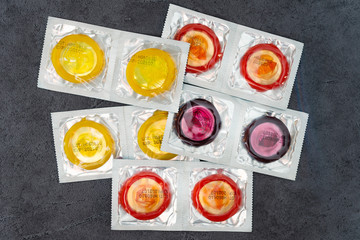 Concept for healthcare - Close up shot of various Colorful condoms