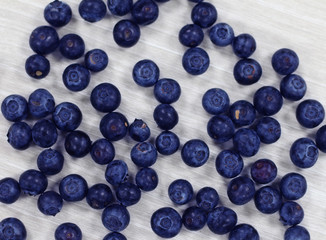 blueberries on wood board