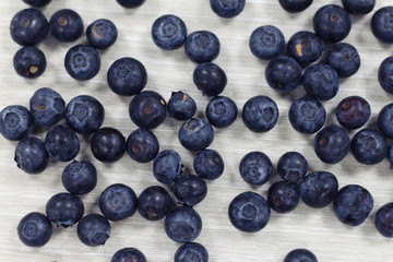 blueberries on wood board