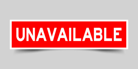 Square red sticker label in word unavailable on gray background