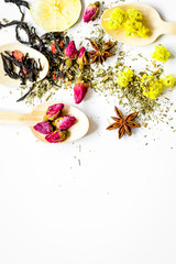 Herbs in spoons on white background top view mock up