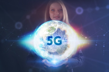 The concept of business, technology, the Internet and the network. A young entrepreneur working on a virtual screen of the future and sees the inscription: 5G