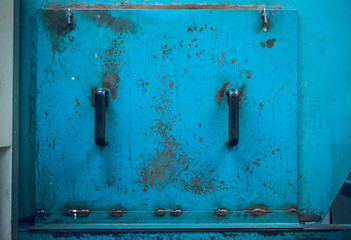 A hard aqua blue and rusty industrial machinery metal texture background, showing signs of scratches, usage. Beautiful industrial arty textured background perfect for type or logo