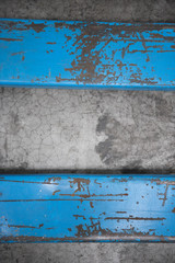 A hard bright blue, industrial palette truck machine metal texture background, showing signs of scratches, usage. Beautiful industrial arty textured background perfect for type or logo