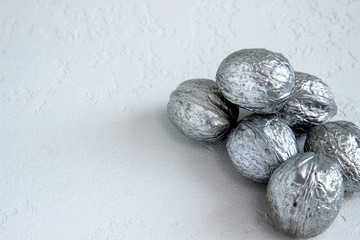New year silver nuts on a white background