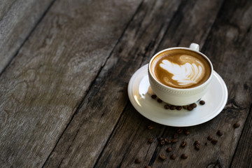 Cup of coffee on a wooden table