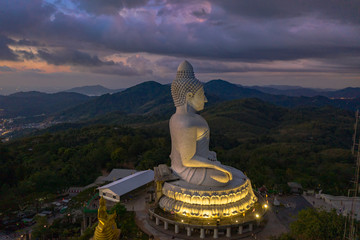 aerial view Phuket big Buddha in twilight. Phuket Big Buddha is one of the island most important and revered landmarks on Phuket island.. © Narong Niemhom