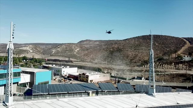 Drone Video Showing US Military Helicopters And Cars Lined Up At San Ysidro San Diego California And Mexican Tijuana Border