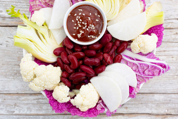 Delicious and healthy salad with colorful vegetables. Rainbow food.
