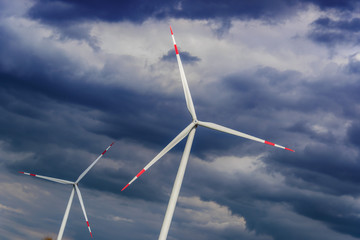 Wind turbines farm. Windmill
