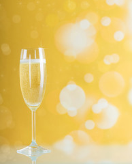 New year's champagne bubbles on a bright yellow background