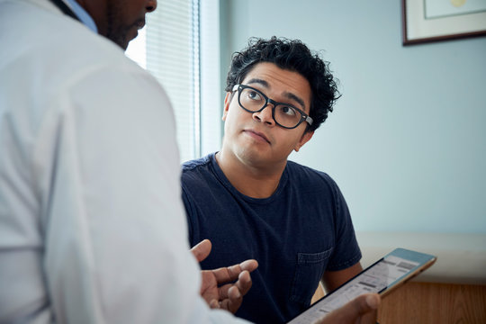 Doctor speaking with patient