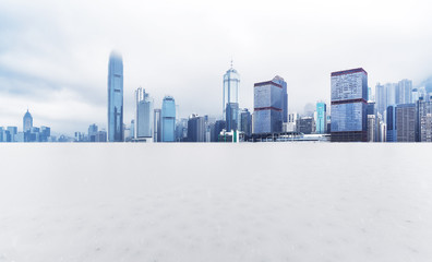Panoramic skyline and buildings with empty snow ground in Hong Kong