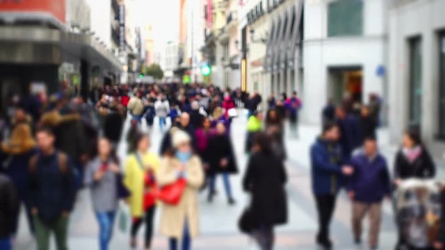 People on streets of Madrid. Out of focus. Slow motion. Shooting in Spain.