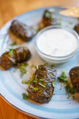 Dolma - traditional asian meat food with sauce