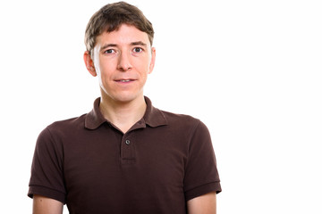 Fototapeta premium Studio shot of man standing and looking at camera
