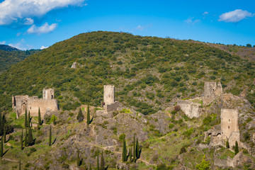 Fototapeta na wymiar The Chateaux de Lastours, in Occitan Lastors, four so-called Cathar castles on a rocky spur above the French village of Lastours