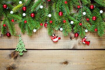Fototapeta na wymiar Christmas decoration on wood background.