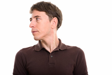 Fototapeta premium Studio shot of man looking away against white background