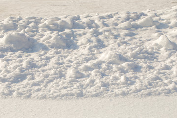 Winter, the surface of fresh fluffy snow, close-up, snowdrift, bumps