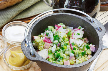 Okroshka, sliced vegetables, summer dish, soup