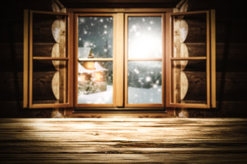 wooden table of free space for your decoration and wooden window with winter landscape 
