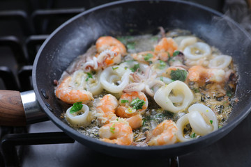 cooking shrimp and octopus