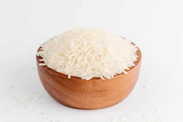 Jasmine rice or Thai Hom mali rice in wood cup on white background