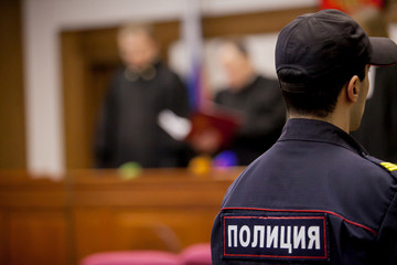 Russian policeman in uniform. Text in russian:
