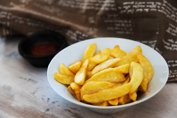 Golden French fries potatoes ready to be eaten