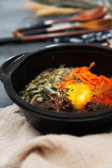 Bibimbap Rice, vegetables, minced marinated beef, spicy sauce and egg yolk