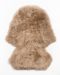 sheepskin fur carpet on white background