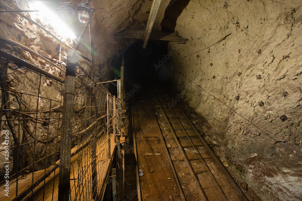 Wall mural underground gold iron ore mine shaft incline tunnel gallery passage human road