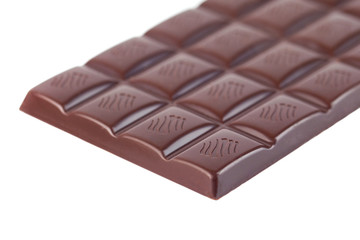 Milk chocolate bar isolated on white background