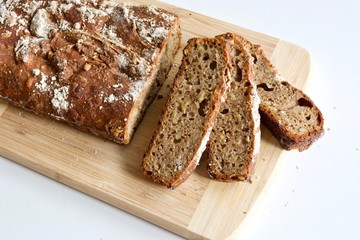 Tasty bread on the wood on the white background