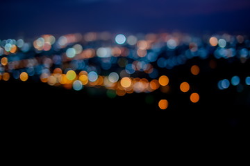 Abstract bokeh on twilight dark bacground under