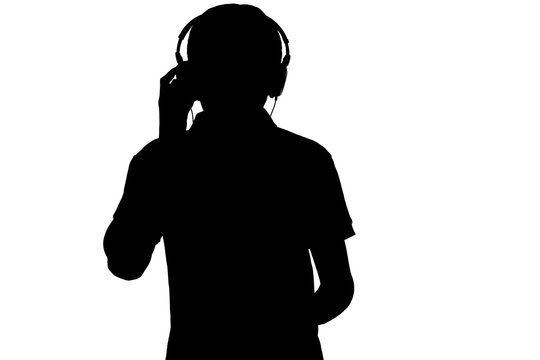 Music Lover Silhouette In Headphones On White Isolated Background, Teenager Boy Enjoying Favorite Song