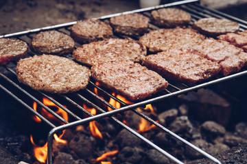Close-up of hamburger meat being grilled on barbecue