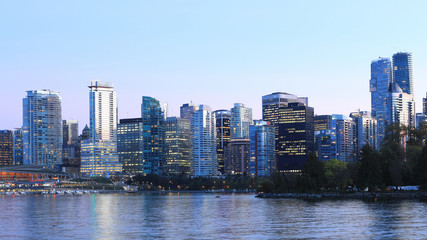 Fototapeta na wymiar Sunset scene of Vancouver, Canada with boats